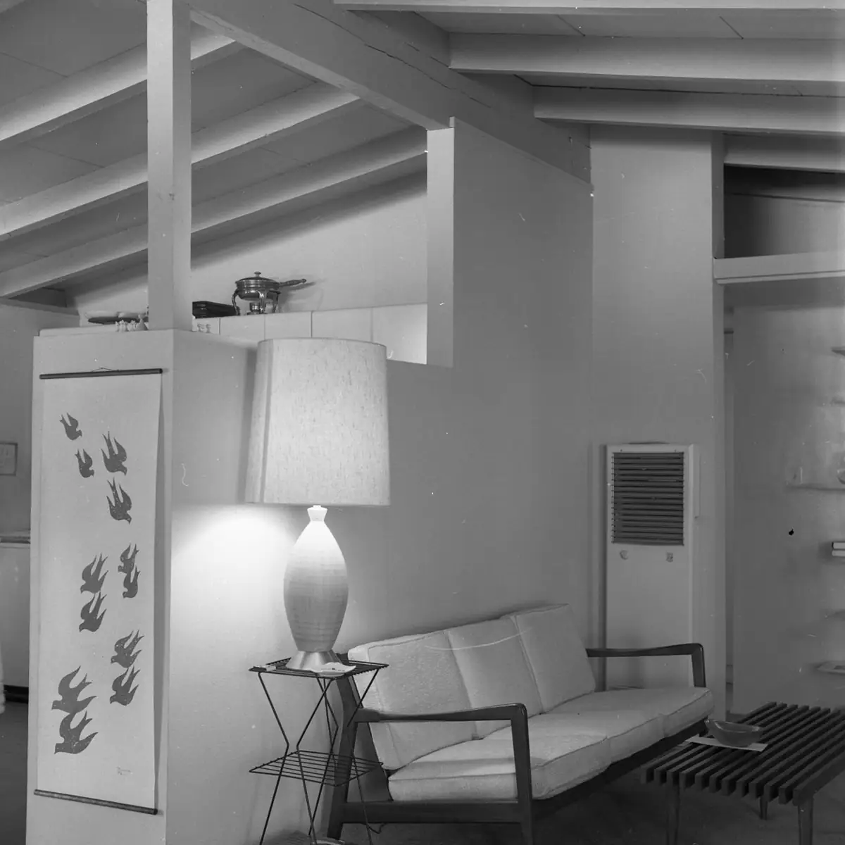 Mid-century modern room with an open-beam ceiling